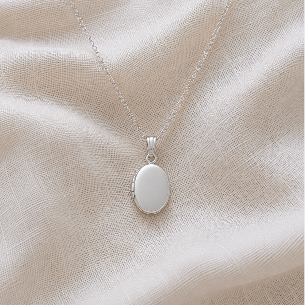 The Petite Silver Oval Locket